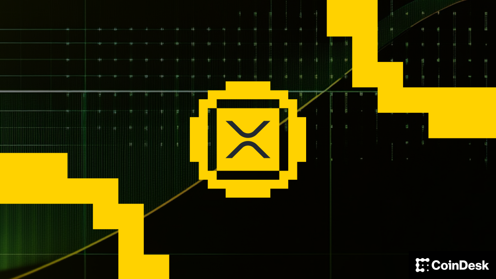 Coinbase logo shown on a laptop screen